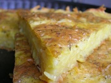 Mescolo le patate grattugiate, formaggio, aglio, e ha inviato nel forno. Semplice e deliziosa